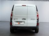 a white van that is parked in a room