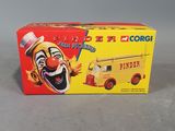 a toy truck with a clown face on the front of it