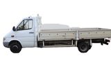 a white truck that is parked on the side of the road