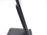 a close up of a cell phone on a stand