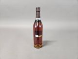 an image of a bottle of wine sitting on a table