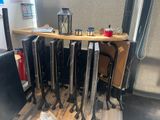 a lot of skis that are sitting on a table