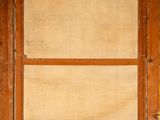 a picture of an old window with a wooden frame