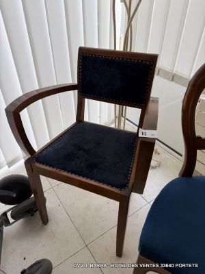 a chair that is sitting in front of a window
