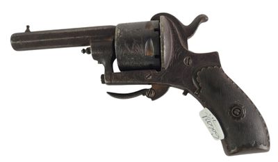 an old gun with a wooden handle on a white background