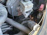 a close up of the engine of a truck with its hood open