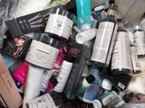 many different types of skin care products in a bin