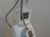 a machine that is sitting on the floor next to a wall