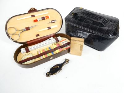 a black case with scissors and a pair of scissors in it