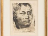 un dessin en noir et blanc représentant le visage d'un homme, dans un cadre doré