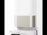 a picture of a white speaker on a stand