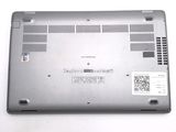 a laptop that is sitting on a white surface