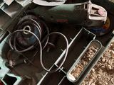 a tool box with tools in it sitting on the ground