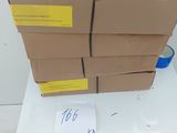 several cardboard boxes stacked on top of each other on a table