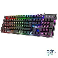 a computer keyboard that is sitting on a white surface