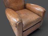 3d model of a brown leather chair on a gray background