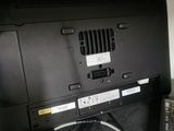 a black laptop computer sitting on top of a black bag