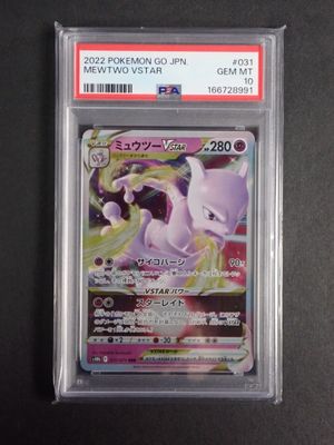 a close up of a pokemon card on a black surface