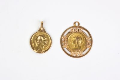two pieces of gold coin with a face of jesus on it