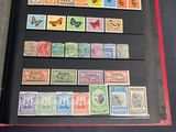 a lot of stamps in a folder on the table