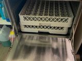 a dishwasher that is sitting inside of a dishwasher