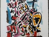 une image représentant un tableau sur lequel figure une moto recouverte de graffitis