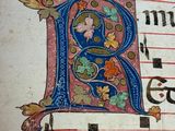 une image représentant un livre contenant une lettrine décorée