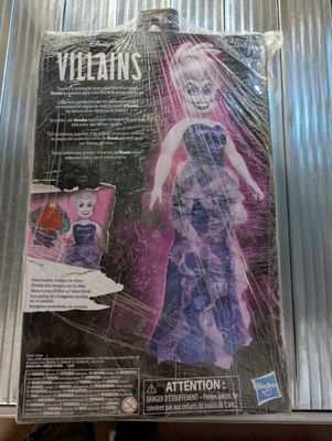 a plastic box with a picture of a woman in a dress on it