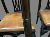 two chairs that are sitting next to each other