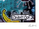 a painting of a banana on a wall with graffiti on it
