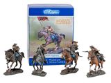 three figurines of men riding horses in front of a box