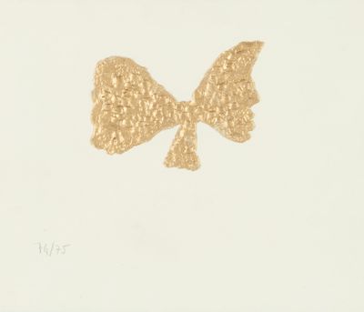 a painting of a gold bow on a white surface