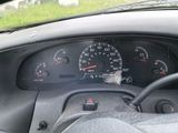 a dashboard with a speedometer and gauges in it