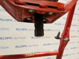 a close up of a red bicycle with a red seat
