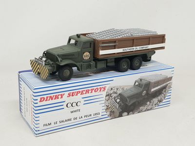 a toy truck that is sitting on top of a box