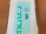 iphone case with a sticker on it sitting on top of a table