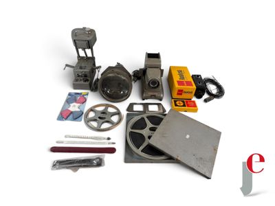 an image of a collection of old movie equipment including a projector and a projector