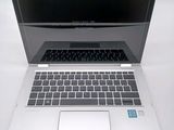 a laptop computer that is sitting on a table