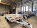 a trailer that is parked in a warehouse