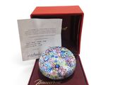 an image of a box with a paperweight inside of it