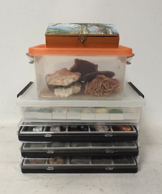a stack of plastic containers with food inside of them