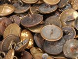 a pile of coins sitting on top of a table