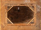 a picture of a hole in the floor with graffiti on it
