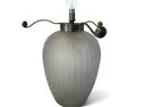 a gray vase with a light on top of it