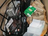 a cardboard box filled with assorted items in it