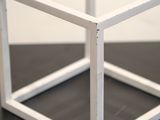 a picture of a small white box on a table