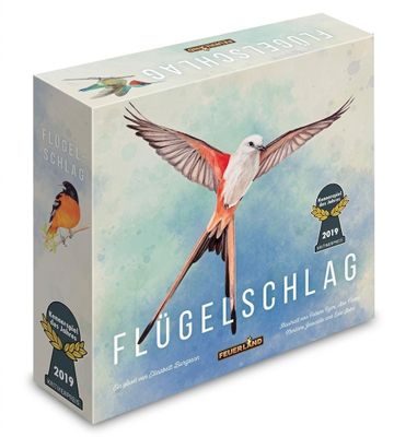 une boîte sur laquelle est représenté un oiseau volant dans le ciel
