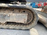 a close up of a tractor tire on the ground
