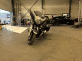 a motorcycle that is parked in a garage