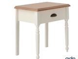 a small table with a drawer on top of it